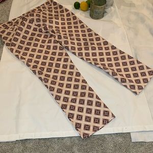 Orange print crop pants